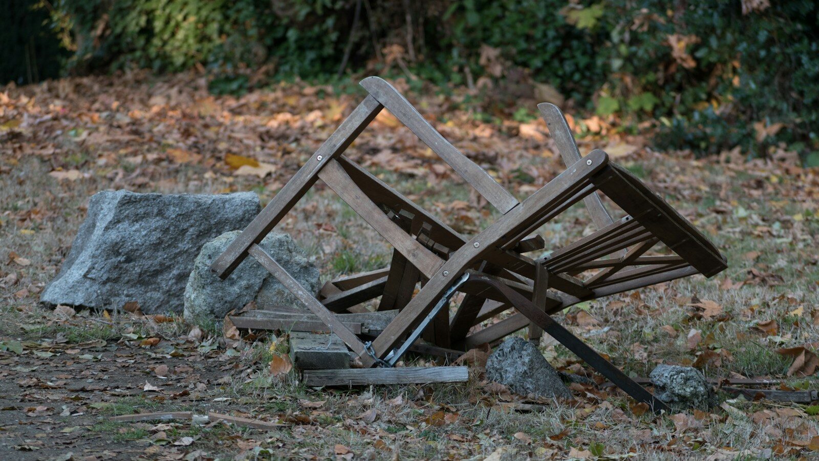 a broken wood bench