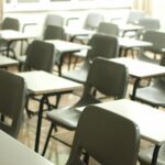white table with black chairs
